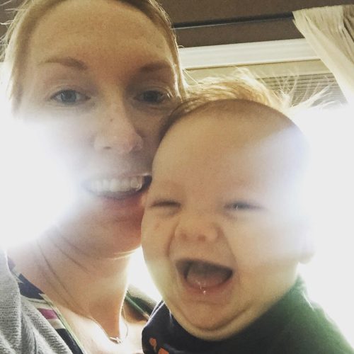 Woman smiling with her smiling baby